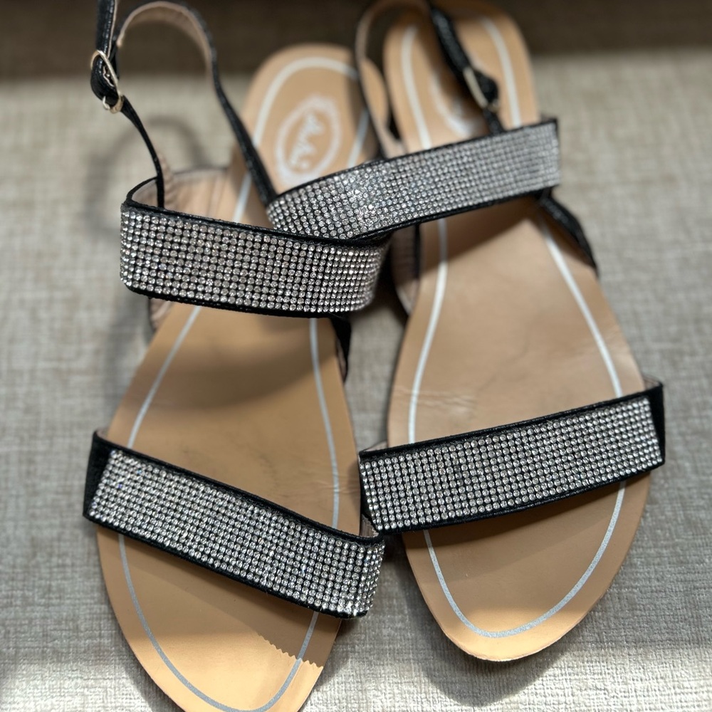 Black strap rhinestone sandals.